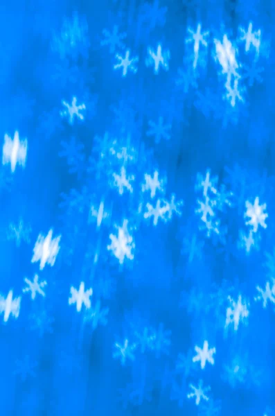 Blurred bokeh copos de nieve de fondo — Foto de Stock