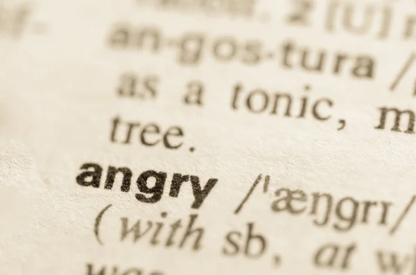 Ordbokens definition av ordet arg — Stockfoto