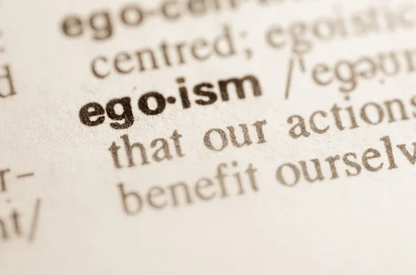 Ordbokens definition av ordet egoism — Stockfoto