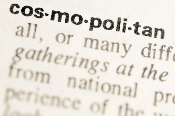 Ordbokens definition av ordet kosmopolitiska — Stockfoto