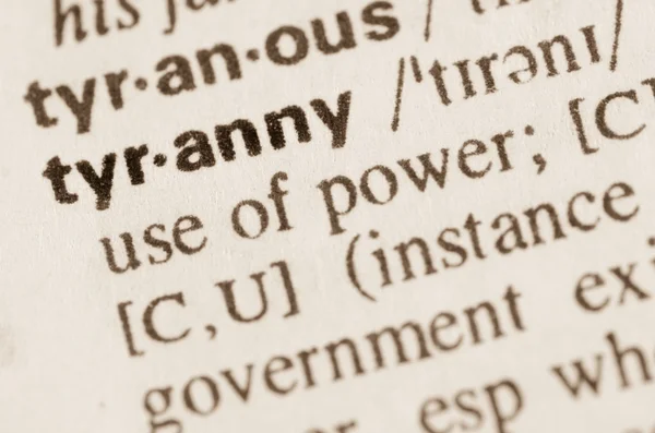 Woordenboekdefinitie van woord tirannie — Stockfoto