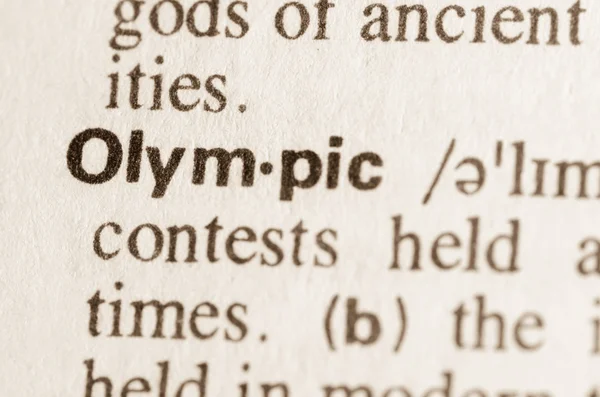 Словник визначення слова олімпійський — стокове фото