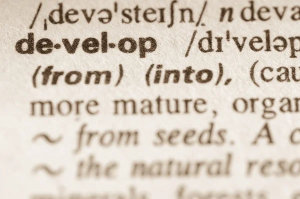 Dictionary definition of word develop — Stock Photo, Image