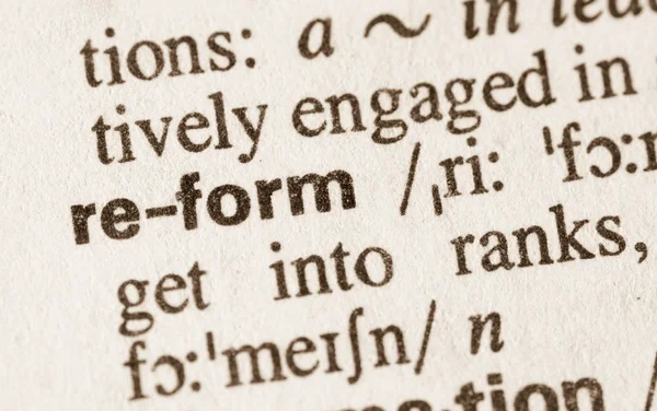 Ordbokens definition av ordet reform — Stockfoto