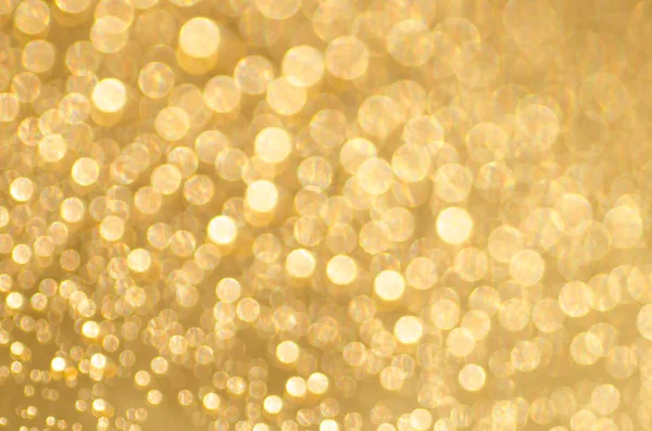 Gold abstrakt suddiga bokeh bakgrund — Stockfoto