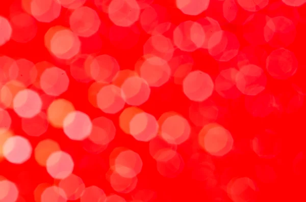 Červené abstraktní bokeh rozmazané pozadí — Stock fotografie