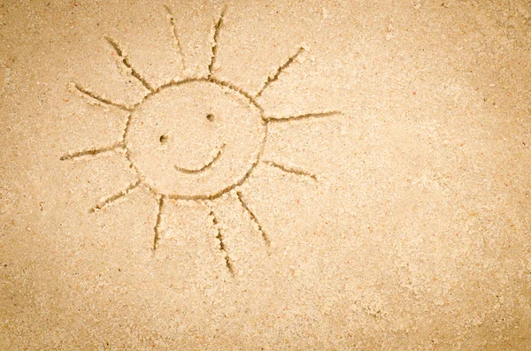 Sun drawing on sand — Stock Photo, Image