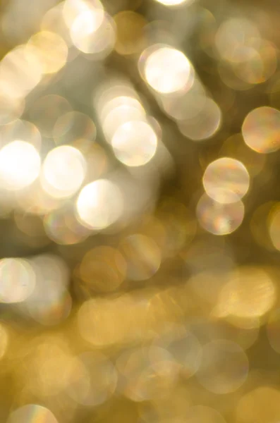 ゴールド ボケ抽象ライト背景 — ストック写真