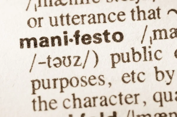 Dictionary definition of word manifesto — Stock Photo, Image