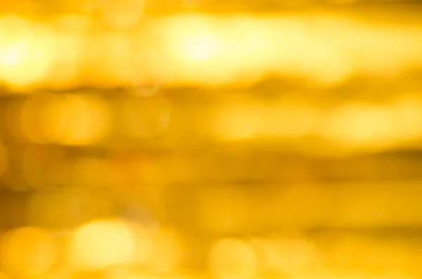 Abstrato desfocado luz cor dourada fundo — Fotografia de Stock
