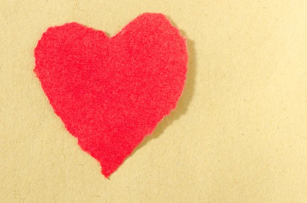 Red heart on paperbackground — Stock Photo, Image