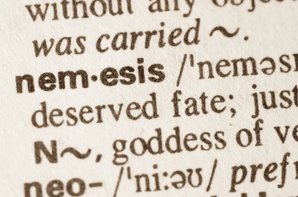 Ordbokens definition av ordet nemesis — Stockfoto