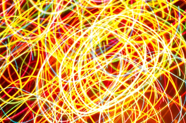 Colorful blurred motion holiday lights — Stock Photo, Image