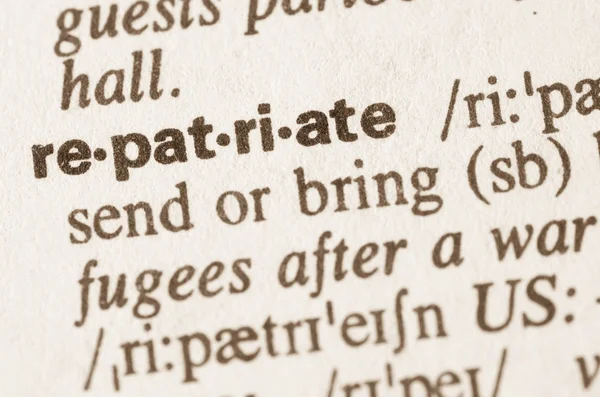 Dictionary definition of word repatriate — Stock Photo, Image