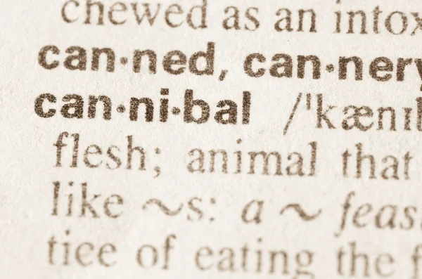 Woordenboekdefinitie van het woord kannibaal — Stockfoto
