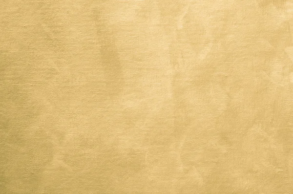 Золотисто окрашенная текстура фона с жемчужным блеском — стоковое фото