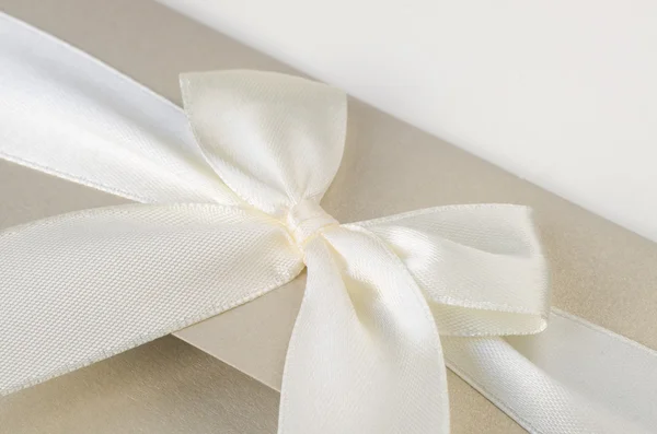 White ribbon on paper — Stock Photo, Image