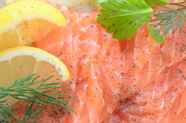 Closeup to salmon carpaccio — Stock Photo, Image