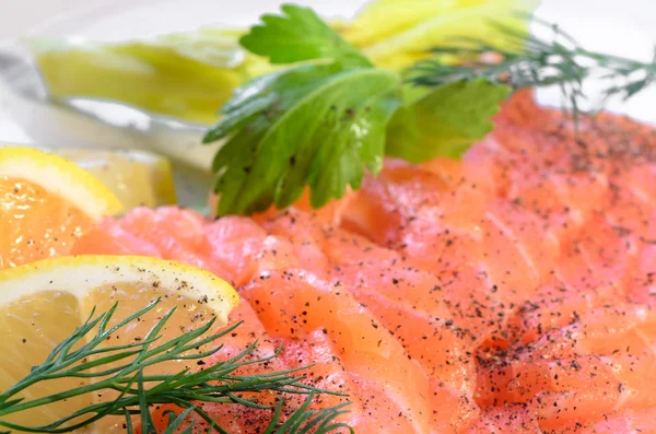 Closeup to salmon carpaccio — Stock Photo, Image