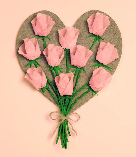 Wooden heart decorated with flowers — Stock Photo, Image