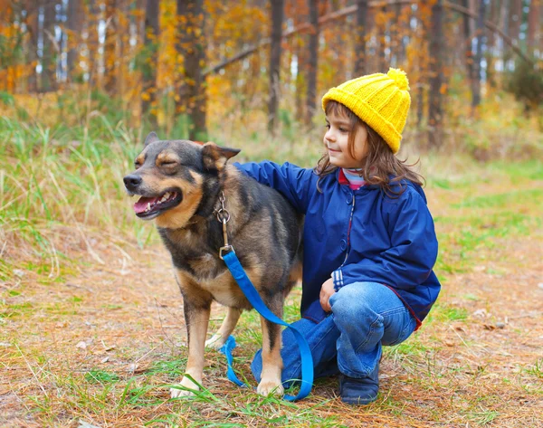 Happy little girl with dog — Stock Photo, Image
