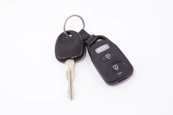 Black car keys and key chain alarm — Stock Photo, Image