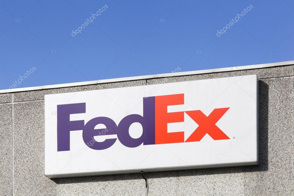 Kolding, Denmark - February 28, 2016: FedEx sign on a wall. FedEx Corporation is an American global courier delivery services company headquartered in Memphis, Tennessee