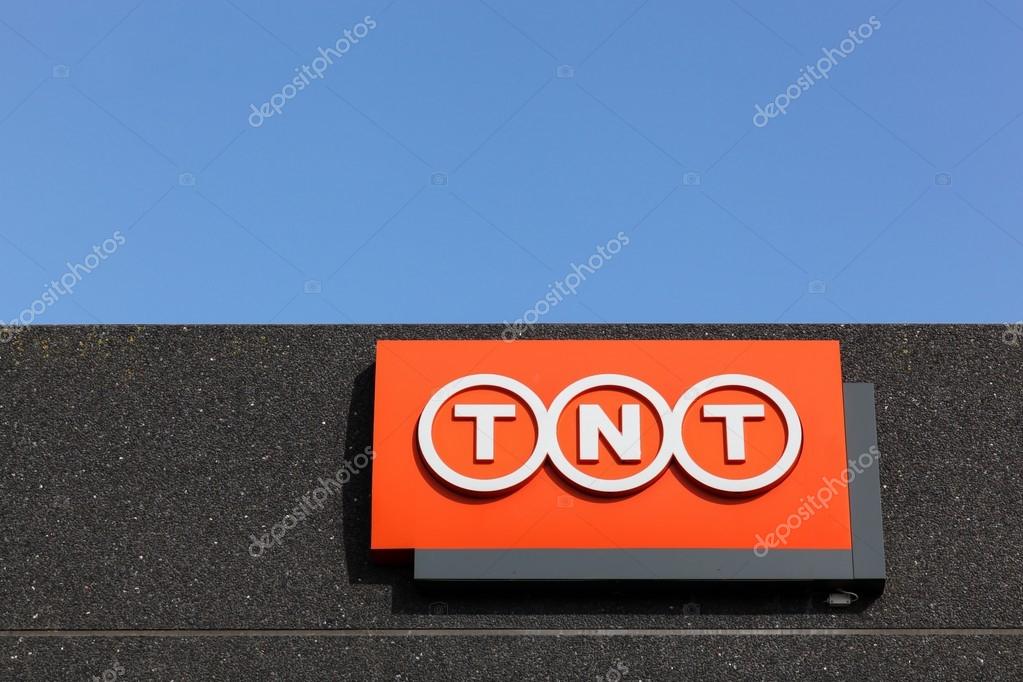 Kolding, Denmark - February 28, 2016: TNT sign on a facade. TNT is an international express, mail delivery and logistics services company with headquarters in Hoofddorp, Netherlands