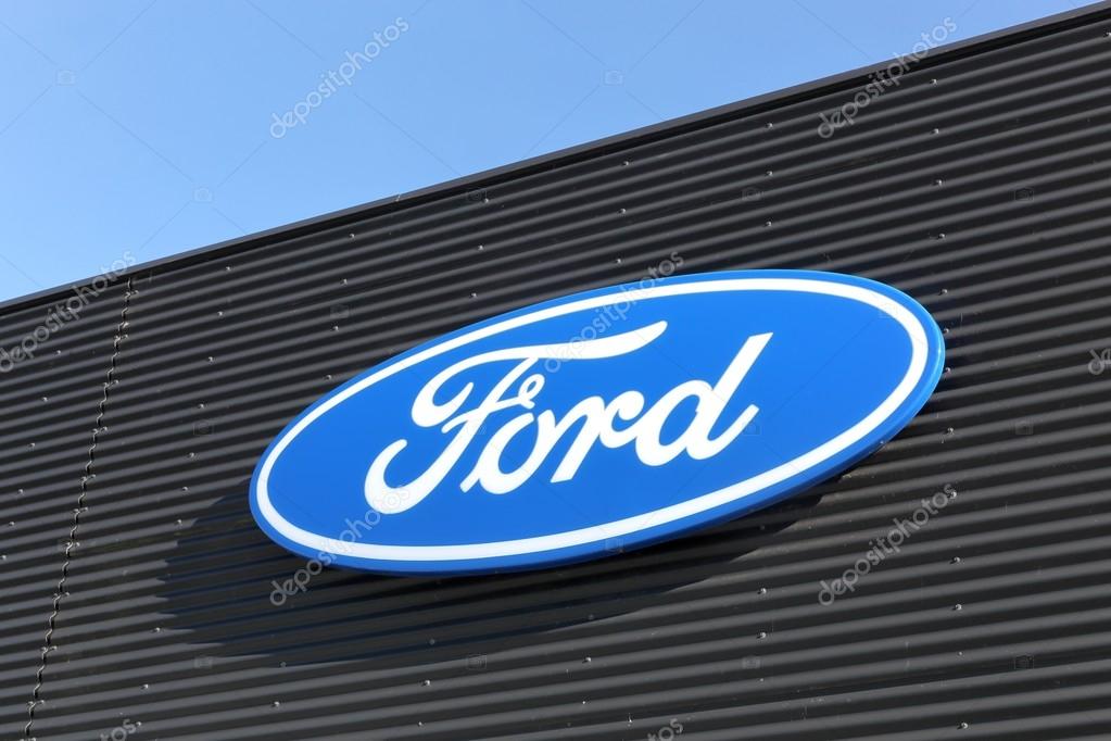 Skanderborg, Denmark - May 5, 2016: Ford logo on a wall. Ford is an American multinational automaker headquartered in Dearborn, Michigan, USA