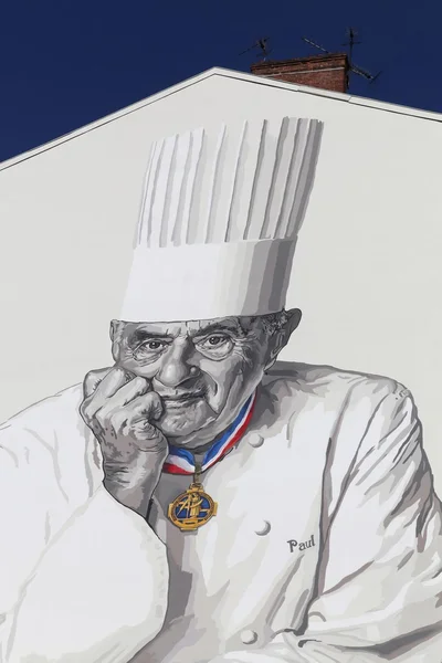 Facade in Lyon with Paul Bocuse portrait, France — Stock Photo, Image