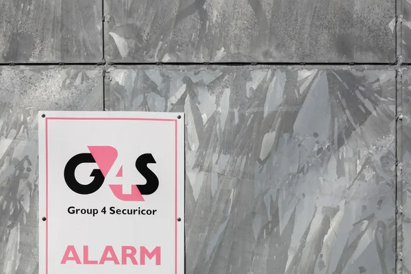 G4S-logotypen på en vägg — Stockfoto