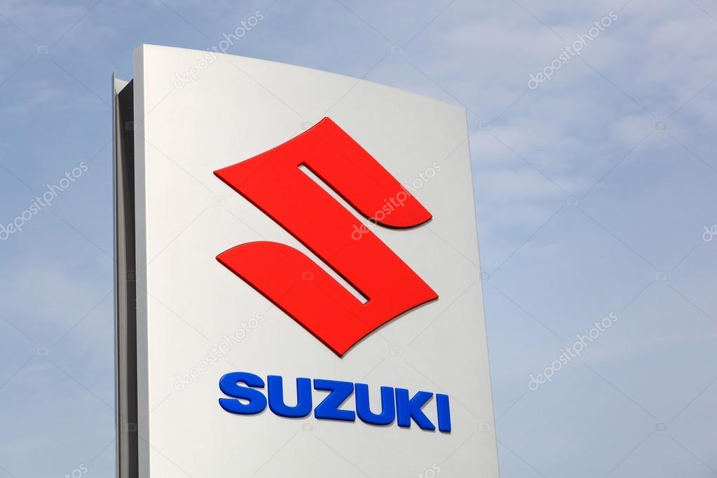 Haderslev, Denmark - May 29, 2016: Suzuki logo on a panel. Suzuki is a Japanese multinational corporation which specializes in manufacturing automobiles, four-wheel drive vehicles and motorcycles