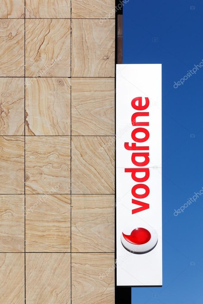 Kiel, Germany - June 4, 2016: Vodafone sign on a wall of a store. Vodafone is a British multinational telecommunications company with its headquarters in London, Great Britain