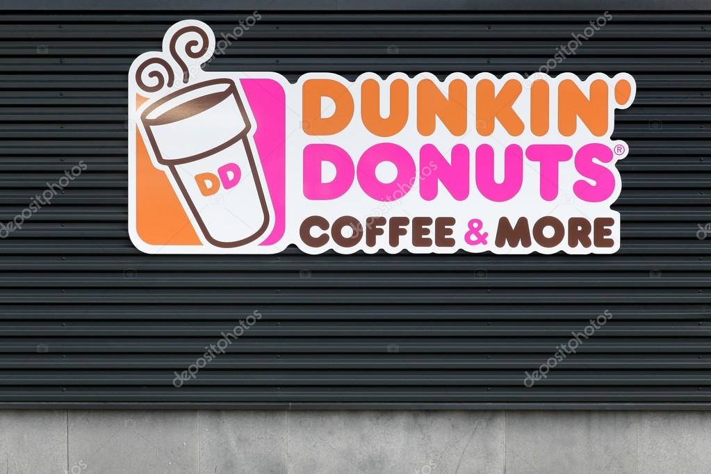 Wasserbillig, Luxembourg - July 24, 2016: Dunkin' Donuts sign on a wall. Dunkin' Donuts is an American global doughnut company and coffeehouse chain.