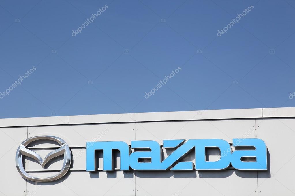 Fredericia, Denmark - September 10, 2016: Mazda logo on dealer facade. Mazda is a Japanese automaker based in Fuchu, Japan
