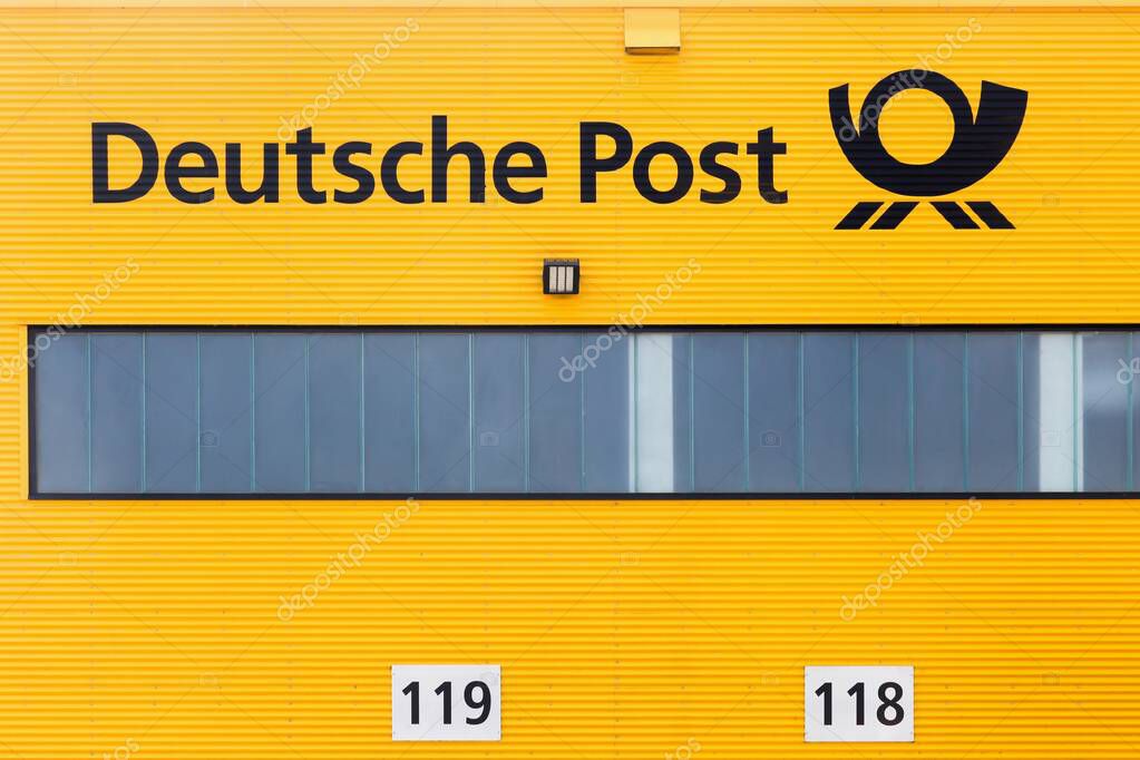Kamen, Germany - July 22, 2018: German post warehouse called Deutsche Post in German. Deutsche Post operating under the trade name Deutsche Post DHL, is a German courier company