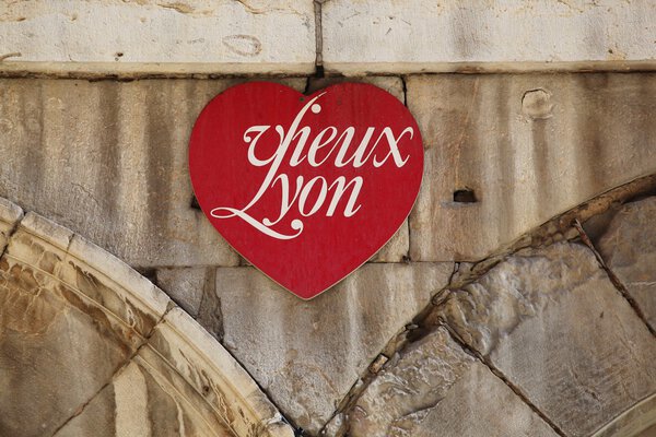 Old Lyon sign on a wall in the street, France
