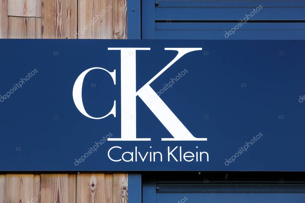 Villefranche, France - July 31, 2022: Calvin Klein logo on a wall. Calvin Klein is an American designer fashion retail chain marketing its eponymously branded products worldwide