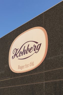 Kohberg logo on a facade clipart