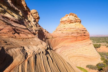 Kuzey Arizona 'daki Vermilion Cliffs Ulusal Anıtı' nın güneyindeki Coyote Buttes 'in güzel manzarası ve kaya oluşumları..