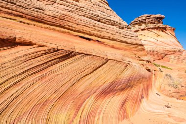 Kuzey Arizona 'daki Vermilion Cliffs Ulusal Anıtı' nın güneyindeki Coyote Buttes 'in güzel manzarası ve kaya oluşumları..