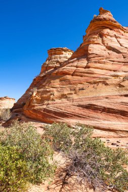 Kuzey Arizona 'daki Vermilion Cliffs Ulusal Anıtı' nın güneyindeki Coyote Buttes 'in güzel manzarası ve kaya oluşumları..