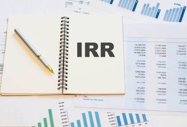 irr - boş bir defter üzerinde tanımlama kağıt üzerinde numaralar ve bir kalem