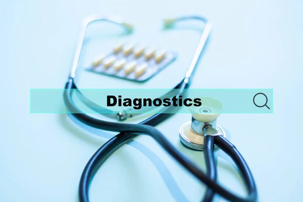 Diagnostics and medicine concept. Stethoscope and search hologram with medical diagnosis