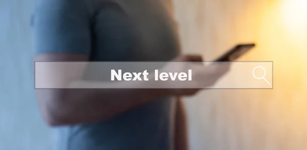 Next level - a man studies on his smartphone
