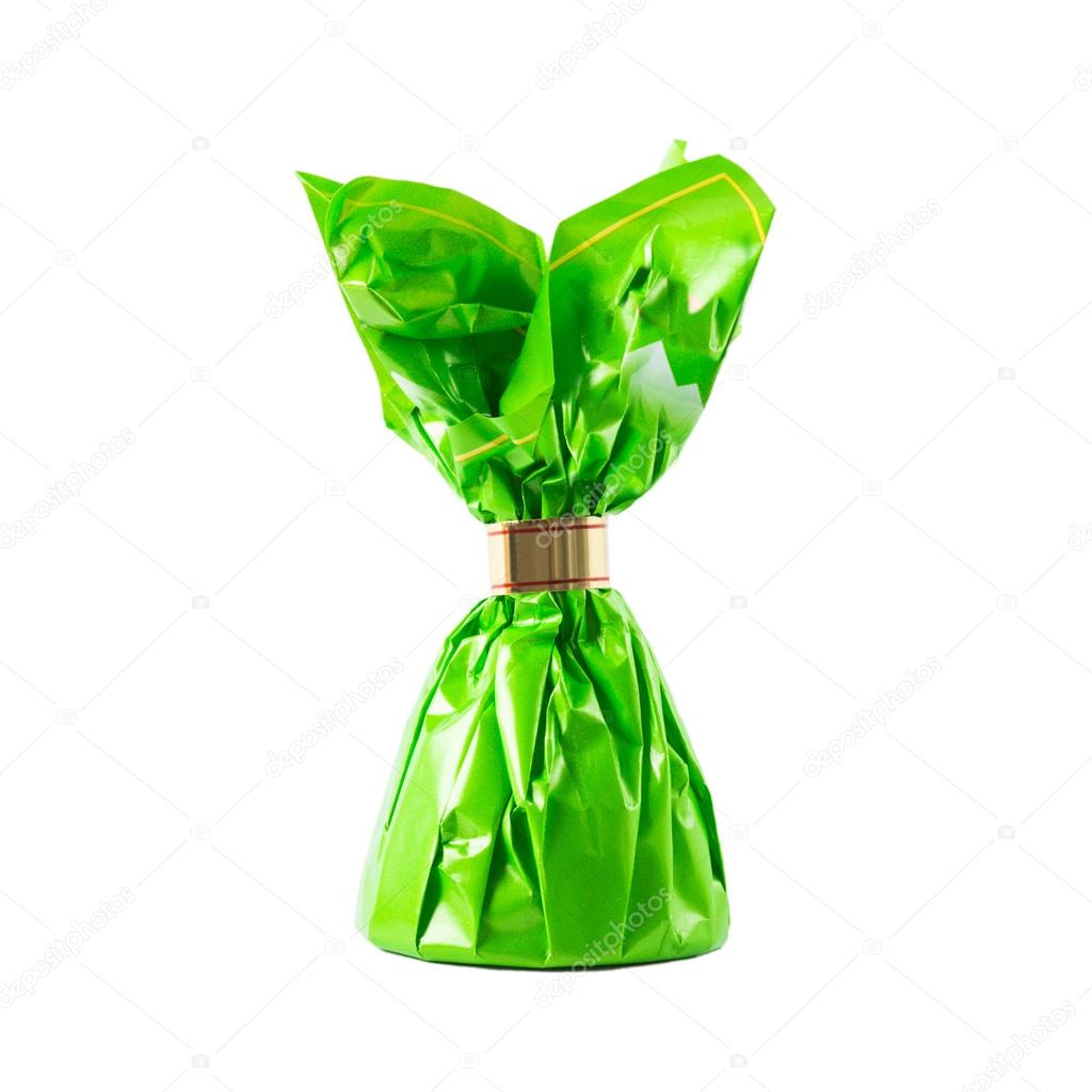Candy in green wrapper - isolated on white background