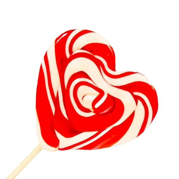 Caramelo rojo en forma de hart en un palo, aislado en blanco — Foto de Stock