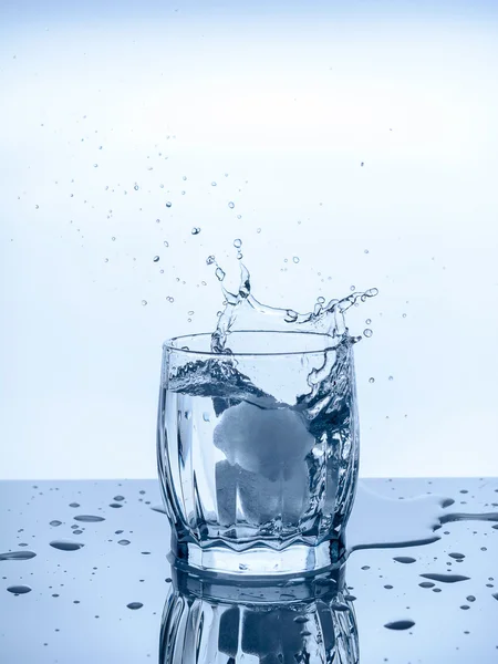 Glass ice splashing — Stock Photo, Image