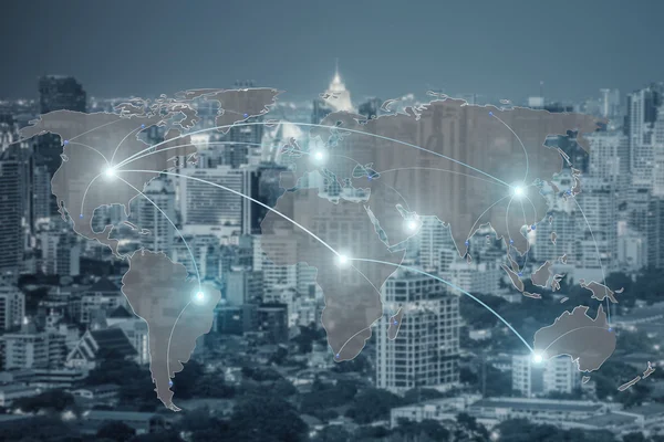 Networking concept - Network and world map on blur city use for — Stock Photo, Image