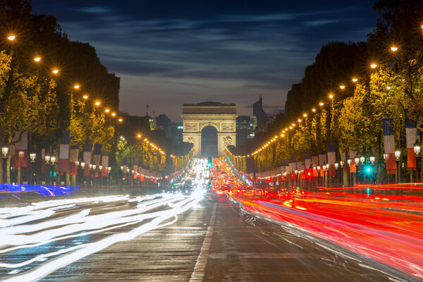 Arc de triomphe Paris city at sunset, France. Champs Elysees str